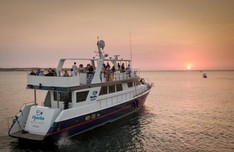 Tour By Boat at the Sunset
